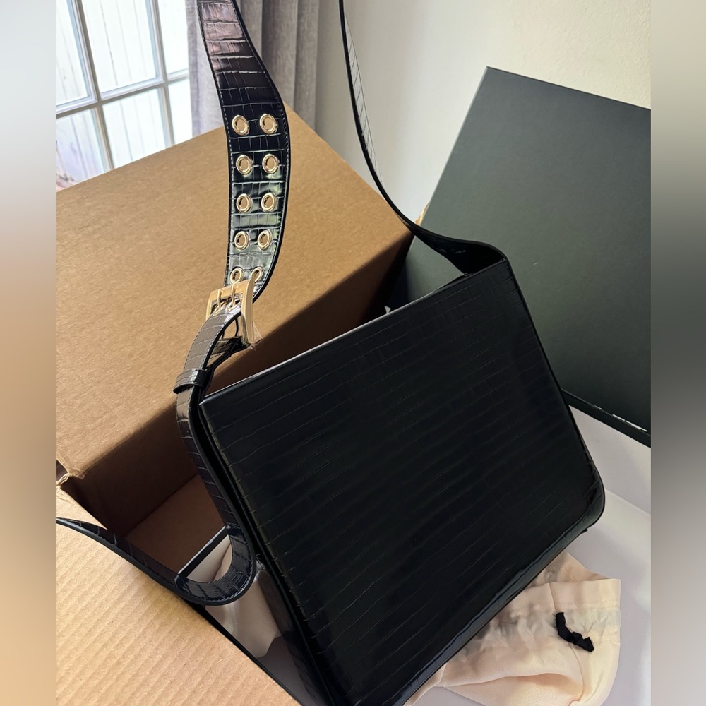 We Wore What sold out laptop bag in vegan leather black